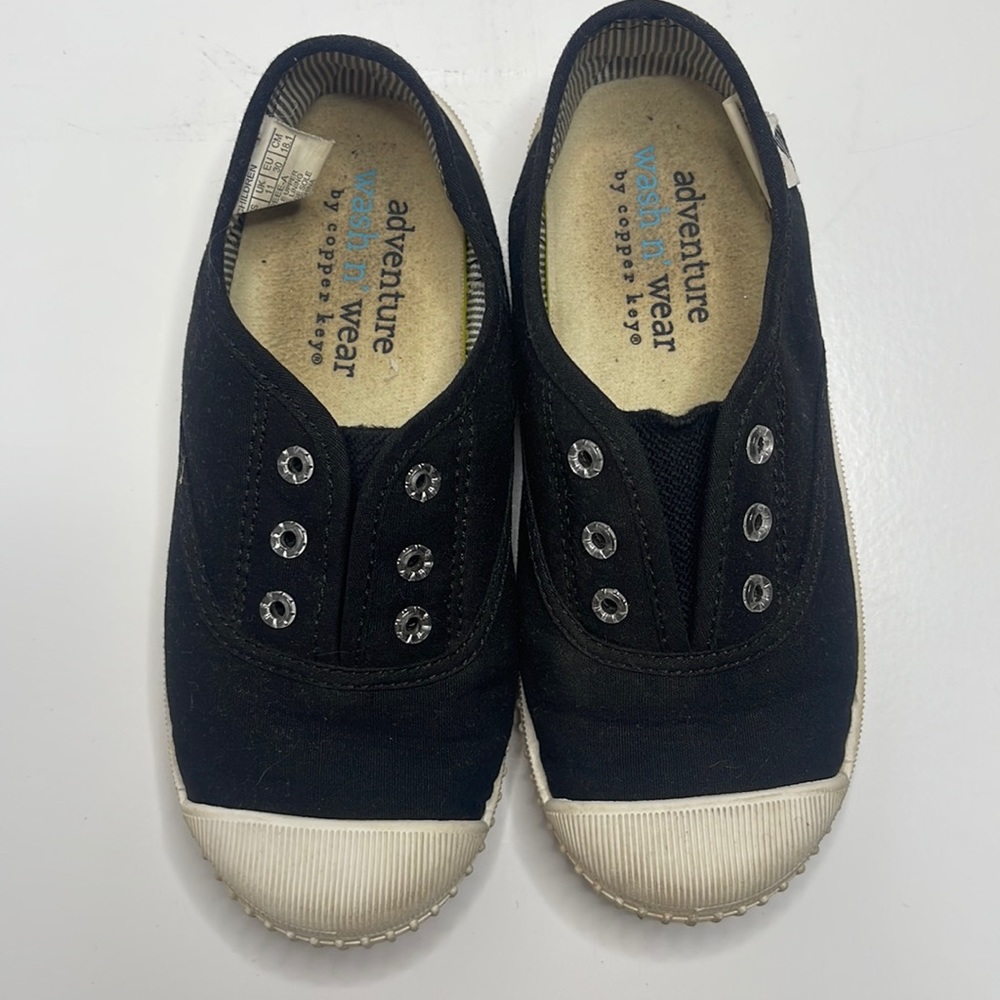 Black slip on sneakers